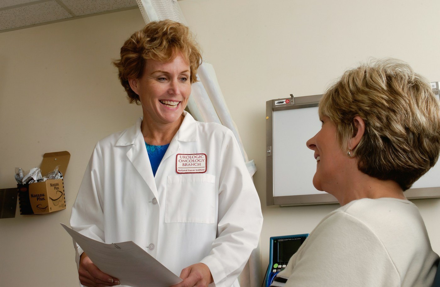 Clinician and woman talking during an appointment